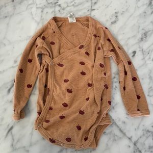 Kate Quinn apple onesie